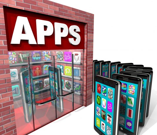 Many mobile smart phones line up to purchase applications at a store marked Apps symbolizing a computer based marketplace for downloadable software